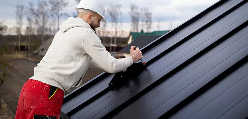 Tin Roof Ridge Cap Installation in Champaign